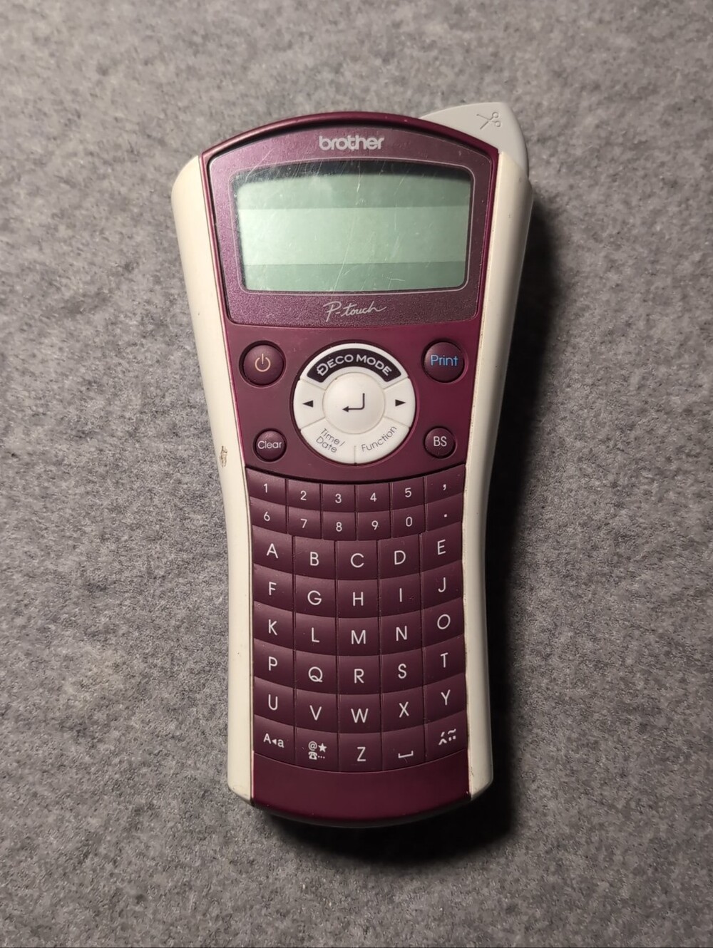 Brother PT-1090 P-Touch Label Maker Personal Handheld Thermal Printer Maroon